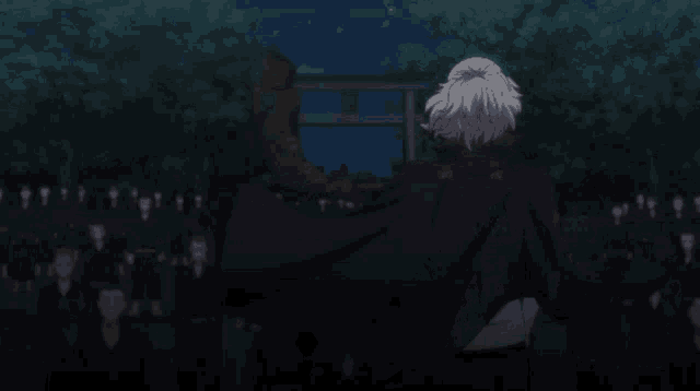 a man in a black jacket with the word tokyo on it
