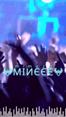 a crowd of people raising their hands in the air with the word miiéee written on the bottom