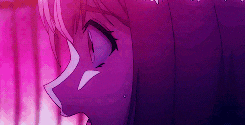 a close up of a person 's face with purple eyes and a purple background .
