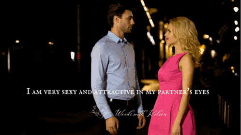 a man in a blue shirt and a woman in a pink dress standing next to each other