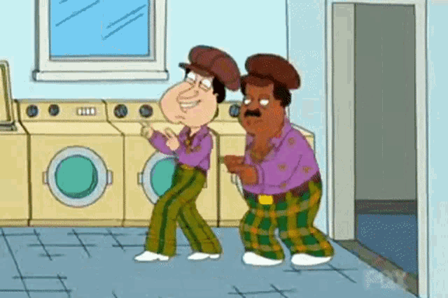 two cartoon characters are dancing in a laundry room with washing machines .