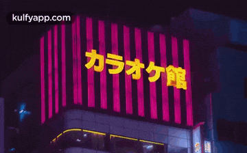 a neon sign that says karaoke on it