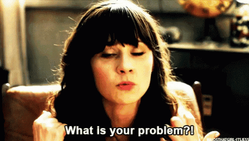 a woman is sitting in a chair and asking what is your problem ?