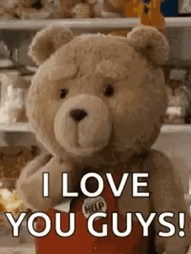 a teddy bear is saying `` i love you guys ! ''