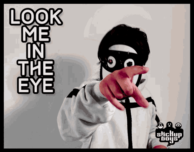 a sticker that says look me in the eye on it
