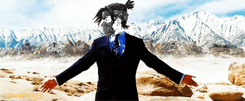 a man in a suit with his arms outstretched is standing in front of snowy mountains