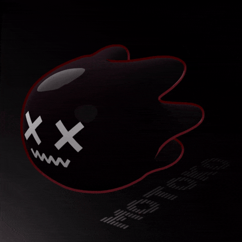 a black object with white crosses on it 's face
