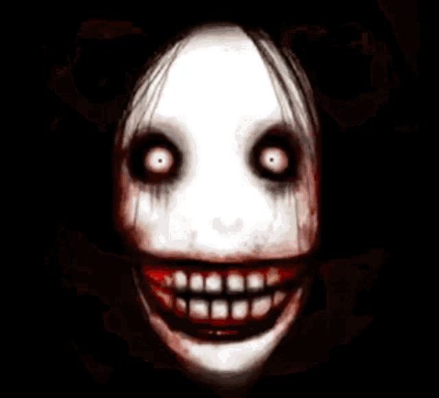 a close up of a scary face with a large smile