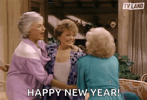 three elderly women are hugging each other and saying happy new year .