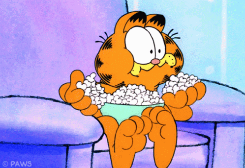 Eating Popcorn Garfield GIF - Eating Popcorn Garfield Snack GIFs