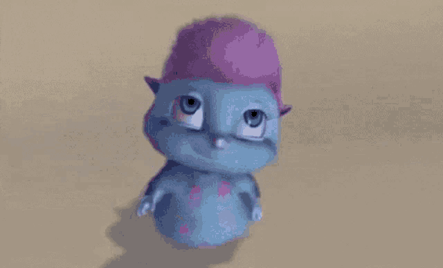 a cartoon character with a pink mohawk is smiling and waving while sitting on the ground .