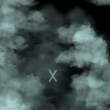 a cloudy sky with the letter x in the foreground