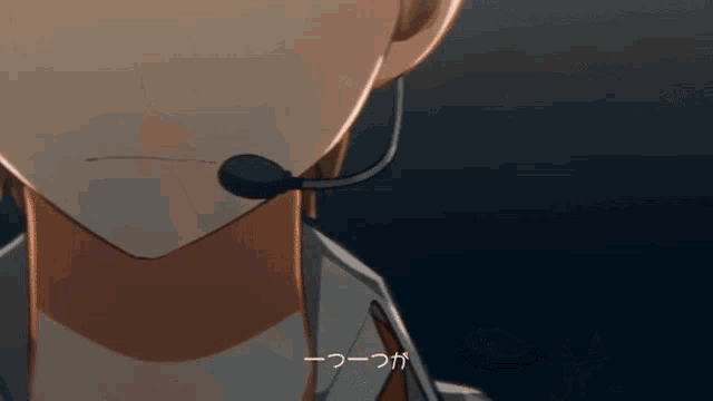 a close up of a person wearing a headset with chinese writing