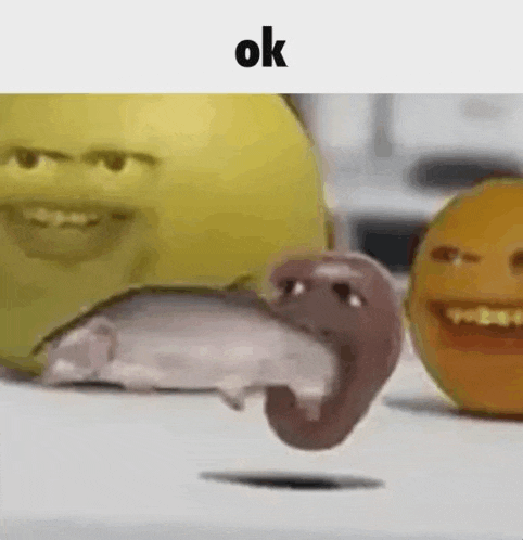 a group of cartoon characters are standing next to each other on a table .