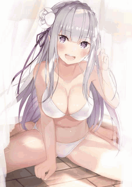 a girl in a bikini is sitting on the floor .