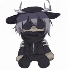 a stuffed animal with a mask on is surrounded by a black and white background