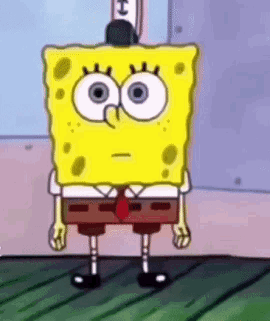 spongebob squarepants is standing on a wooden floor wearing a tie and a hat .
