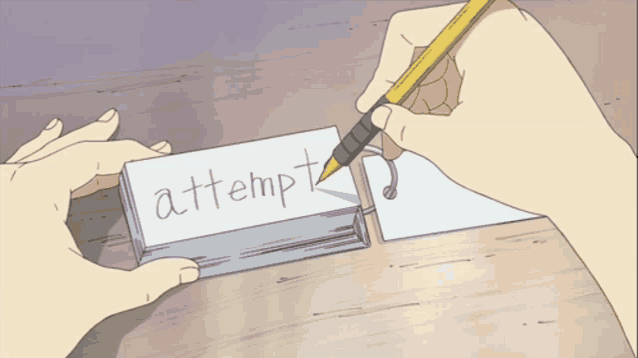 a person writing attempt on a card with a pencil