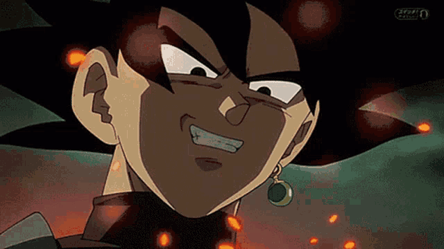 a close up of a cartoon character 's face with fire coming out of it .