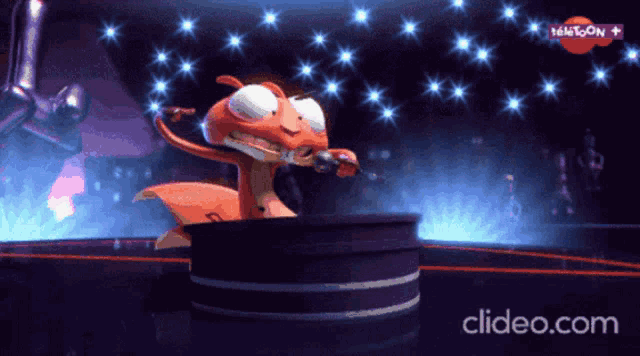 a cartoon squirrel singing into a microphone on a stage sponsored by teleton