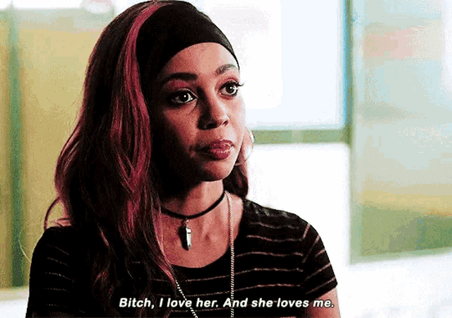 a woman with red hair is saying bitch , i love her .