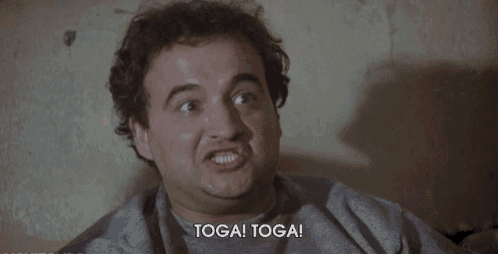 a man in a gray shirt says toga