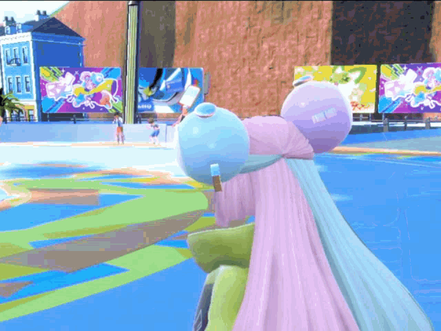a girl in a pink cape is standing in front of a sign that says ' disney '