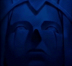 a close up of a statue 's face with a blue background
