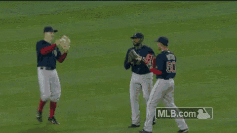 a baseball player with the number 50 on the back of his shirt