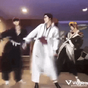 a group of people are dancing in a room with a purple background and the word vaggiero on the bottom