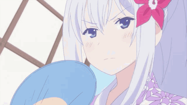 a girl with white hair and a pink flower in her hair looks angry