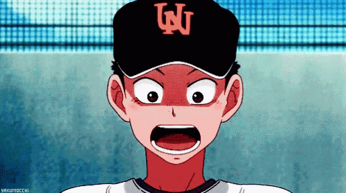 a baseball player wearing a hat with the letter n on it