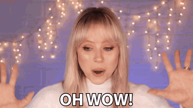 a woman with blonde hair says oh wow