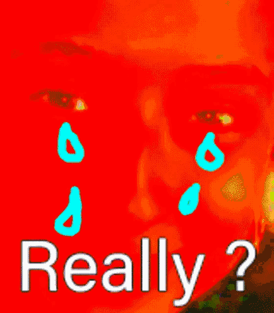 a man 's face with green tears coming out of his eyes and the words `` really '' .