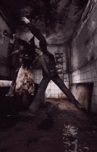 a person is standing in a dark room with a poster on the wall that says ' a ' on it