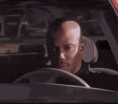 a man in a black shirt has a badge on his shoulder that says ' u.s. coast guard '