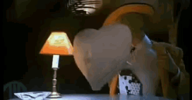 a lamp is lit up in a dark room