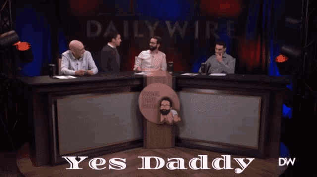 a group of men are sitting at a table with the words " yes daddy " on the bottom