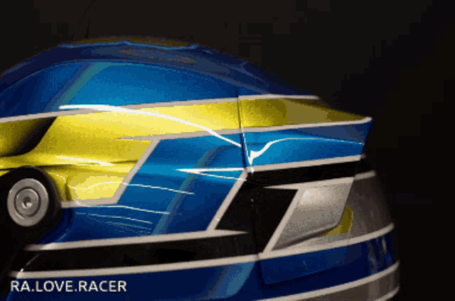 a close up of a helmet that says ra love racer on it