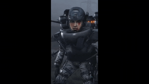 a man in a futuristic armored suit with a helmet on