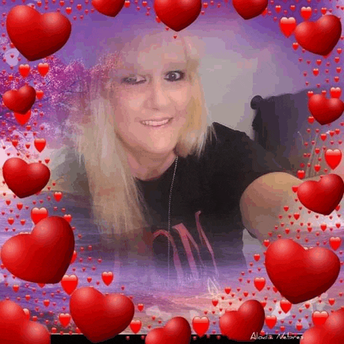 a picture of a woman surrounded by red hearts with the name alodia motors written on the bottom