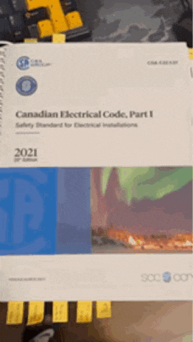 a book titled canadian electrical code part i is sitting on a table