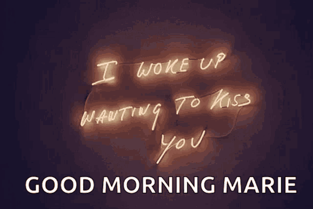 a neon sign that says i woke up wanting to kiss you good morning marie