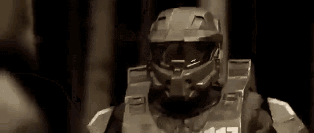 a close up of a man wearing a helmet and armor .