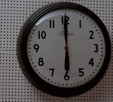 a clock that has the word teletron on the front