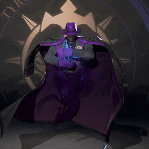 a man in a purple cape and hat stands in front of a clock that says ty