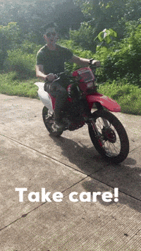 a man is riding a dirt bike with the words take care written below him