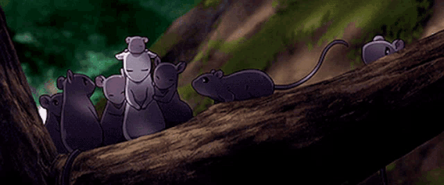 a group of mice sitting on a tree branch