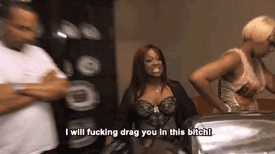 a woman says " i will drag you in this bitch "