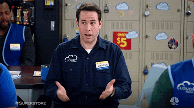a man wearing a shirt that says cloudy on it